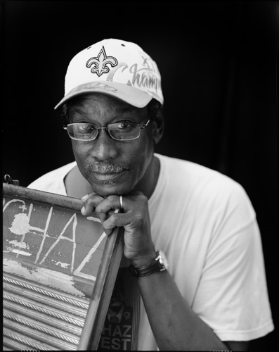 Washboard Chaz photographed at Chaz Fest in 2010. I used 1 camera, 1 lens. No lights no nothing. I made it easy and comfortable amidst a loud music festival!